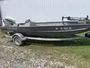 Lowe boat trailer and motor