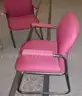 7 red cloth chairs