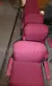 7 red cloth chairs