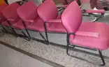 7 red cloth chairs
