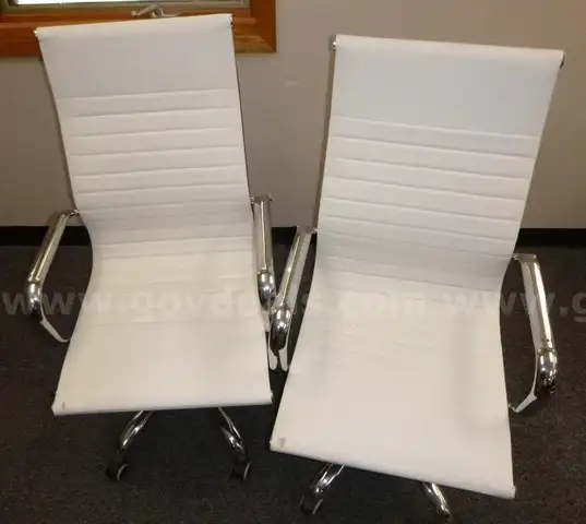 2 white chairs