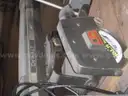 radial arm saw on stand