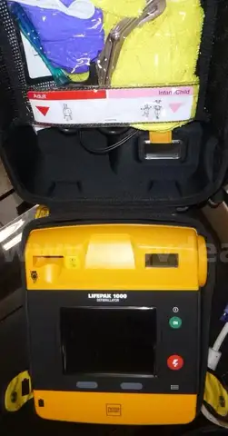 Misc. lot, printer, slide projector, Lifepak Defibrillator, wires,