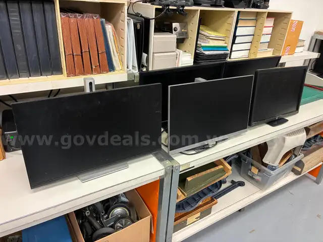Lot of computer monitors