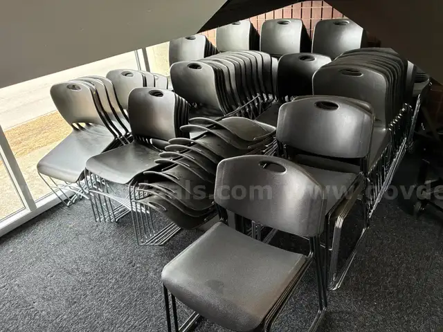 Lot of 124 Gray Stacking Chairs With 2 Dollies
