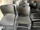 Lot of 124 Gray Stacking Chairs With 2 Dollies
