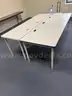 Long student tables with cord storage