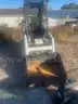 Bobcat S70 with 3&#x27; front bucket attachment and pallet fork attachment