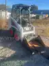 Bobcat S70 with 3&#x27; front bucket attachment and pallet fork attachment