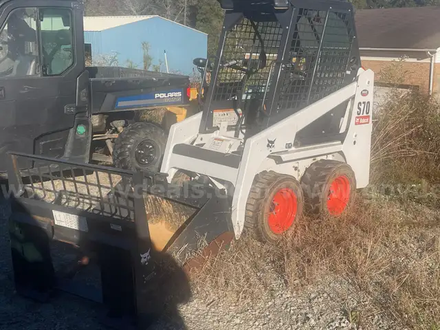 Bobcat S70 with 3&#x27; front bucket attachment and pallet fork attachment