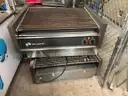 Two (2) Hot Dog rollers.