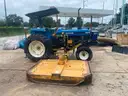 1999 New Holland 6610S with bush hog