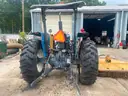 1999 New Holland 6610S with bush hog
