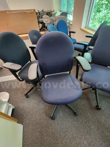 8 Blue and Black Roll Chairs with Arms