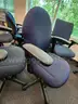 8 Blue and Black Roll Chairs with Arms