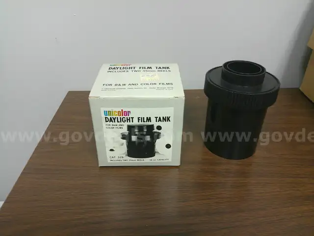 Assortment of photographic film developing tanks with Adjustable Reels