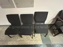 1 LOT of (12) Chairs Black Vinyl and Cloth Stackable