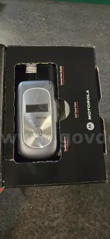 1 LARGE LOT of (38) MOTOROLA CELL PHONES and (46) CELL PHONE HOLSTERS