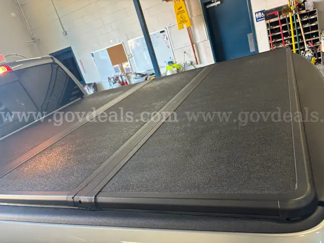 6.4&#x27; Bed Solid Tri-Fold Bed Cover (1 of 2) - off a 2022 RAM 2500 Tradesman