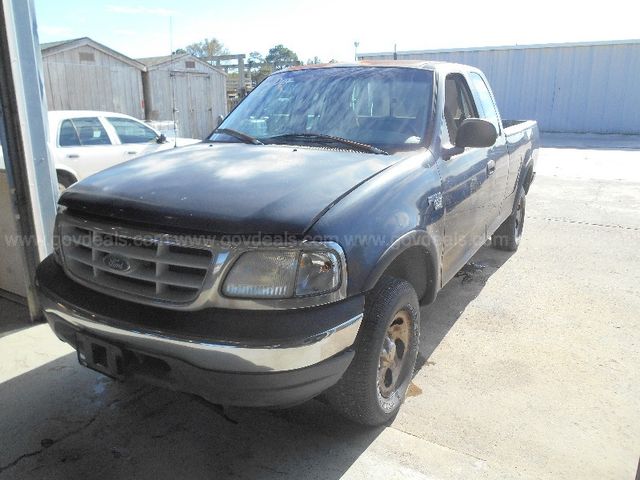 1999 Ford F-150 WS SuperCab Short Bed 4WD | AllSurplus