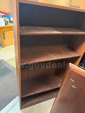 L-shaped desk, bookcase, small filing cabinet, and desktop printer