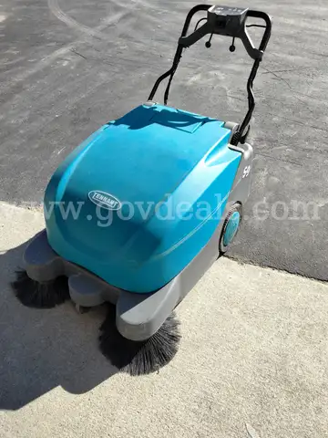 Used/broken Tennant S9 walk behind sweeper