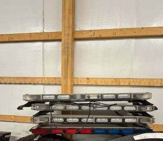 Lot of used overhead police emergency light bars
