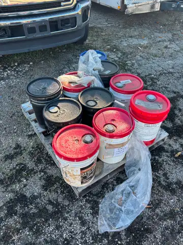 5 Gallon Containers of Hydraulic Fluid