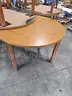 (14) WOODEN TABLES (4FT ROUND)