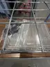 SMALL METAL DISPLAY RACK WITH WHEELS
