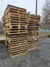 (80) USED WOOD PALLETS (48IN L X 40IN W)