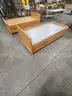 (2) WOODEN TWIN SIZE BEDS WITH STORAGE DRAWERS (79IN L X 40IN W X 27IN H)