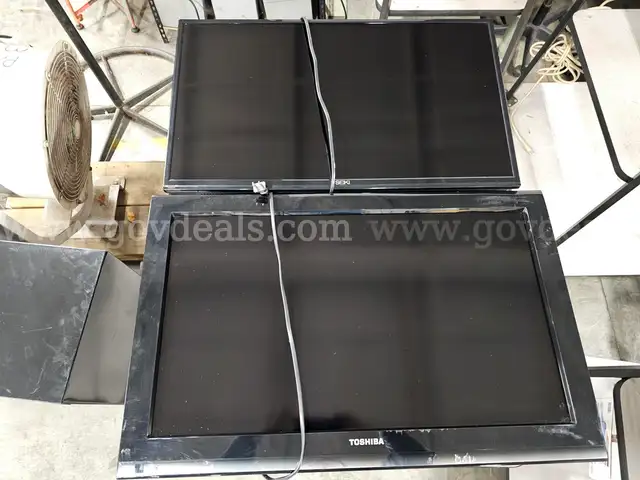 (2) 32 INCH TV'S (NO REMOTES OR STANDS)