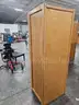 WOODEN STORAGE WARDROBE (76IN L X 26IN W X 25IN H)