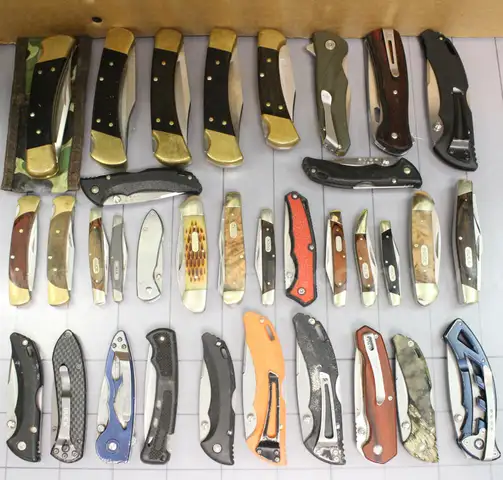 Approx. 6 lbs. of Assorted BUCK Knives, #33975