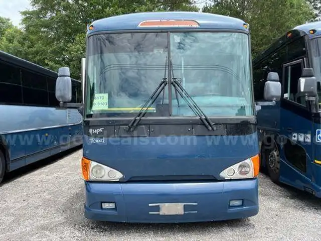 2014 MCI D4500 BUS (202966- LT DOT)