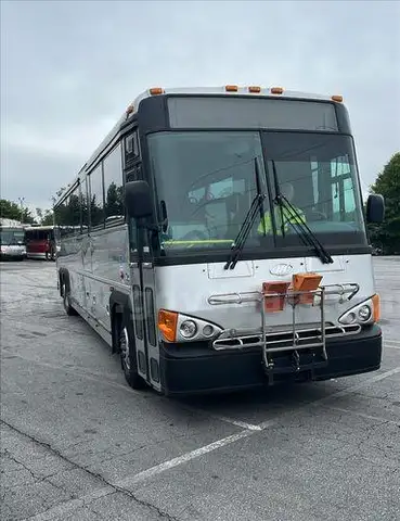 2004 MCI Transit Bus (204384 NM)