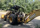 1999 John Deere 310SE  (207089 AJ: DOT)