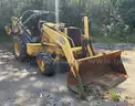 1999 John Deere 310SE  (207089 AJ: DOT)