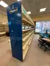 Lot containing various sizes, styles, and configurations library book and magazine shelving and book carts.