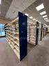Lot containing various sizes, styles, and configurations library book and magazine shelving and book carts.