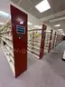 Lot containing various sizes, styles, and configurations library book and utility shelving.