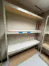 Lot containing various sizes, styles, and configurations library book and utility shelving.