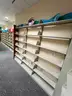 Lot containing various sizes, styles, and configurations library book and utility shelving.