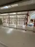 Lot containing various sizes, styles, and configurations library book and utility shelving.