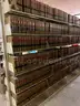 Lot containing various sizes, styles, and configurations library book shelving (books included)