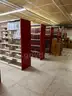 Lot containing various sizes, styles, and configurations library book shelving (books included)