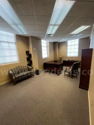 Lot containing one complete office suite.