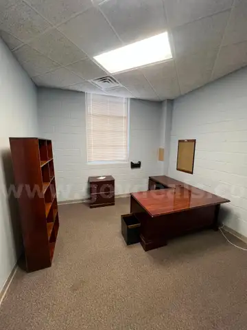 Lot containing one complete office suite.