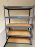 Lot containing metal storage cabinets and metal storage shelving units.